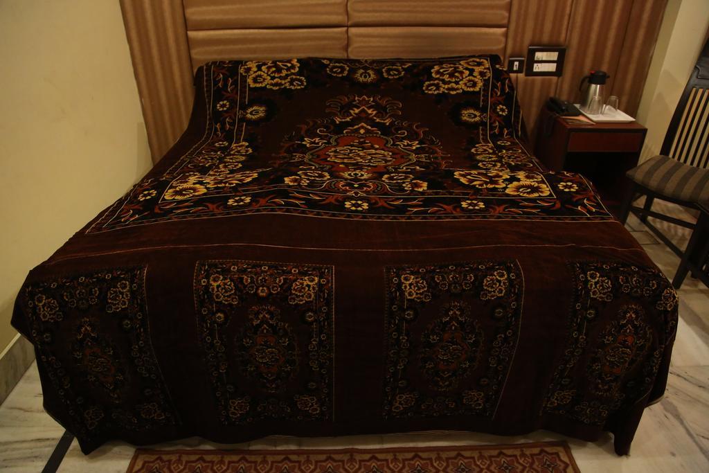 Hotel Wall City New Delhi Rum bild