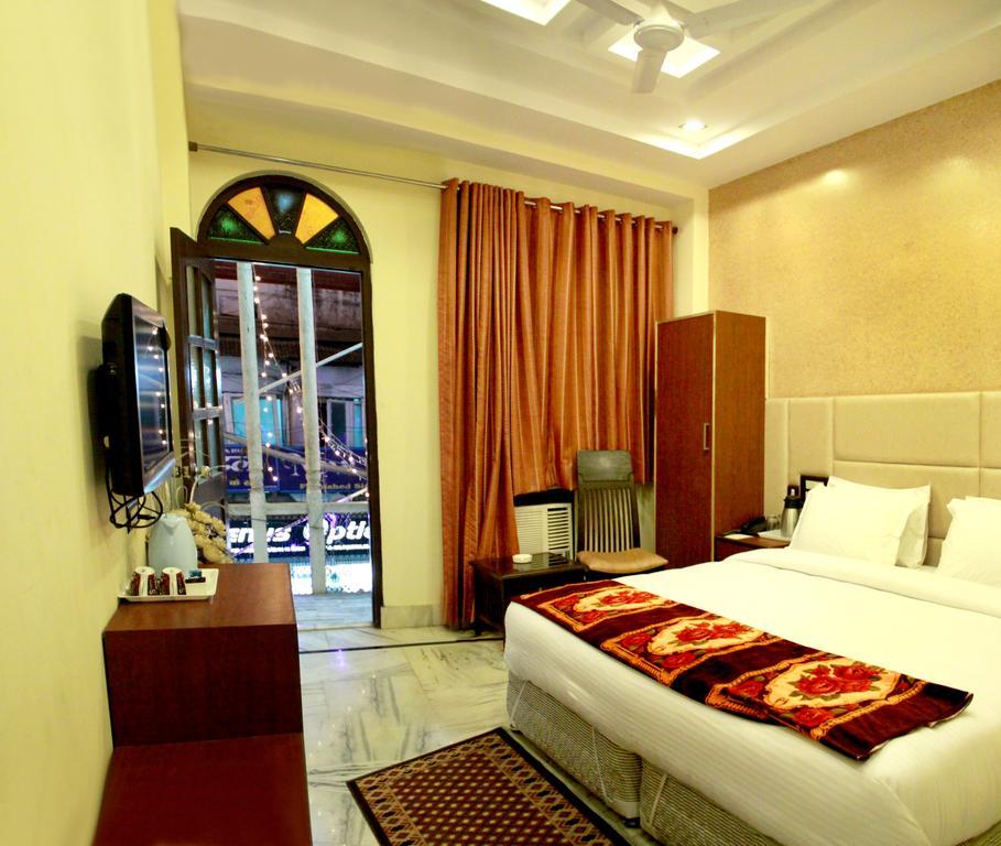 Hotel Wall City New Delhi Rum bild