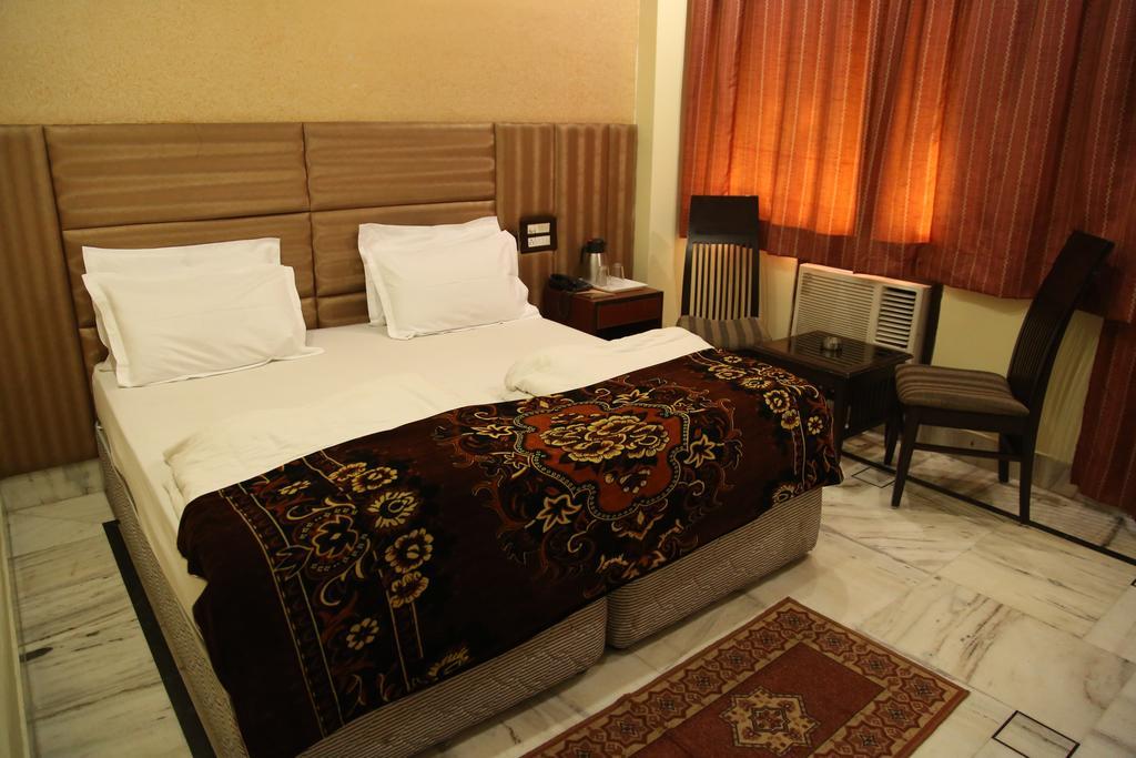 Hotel Wall City New Delhi Rum bild
