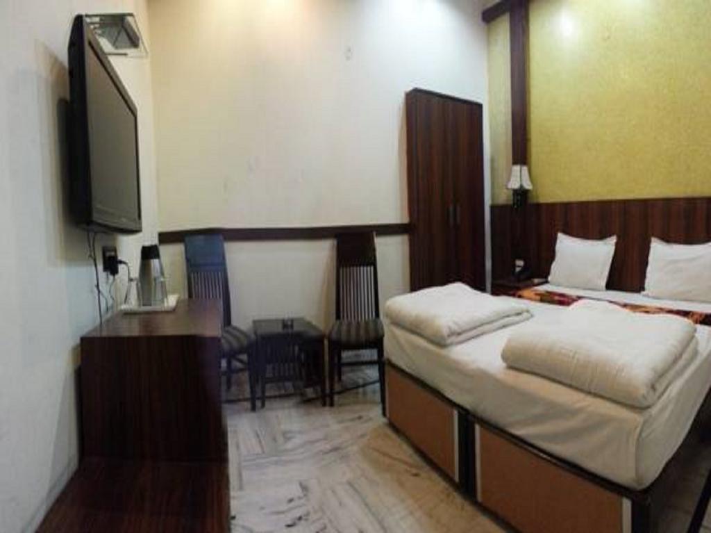 Hotel Wall City New Delhi Rum bild